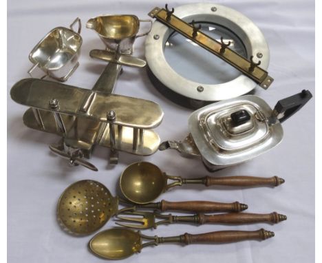 MIXED LOT OF COLLECTABLESincluding a chrome model of a bi-plane with a rotating propeller, a circular aluminium ships port ho