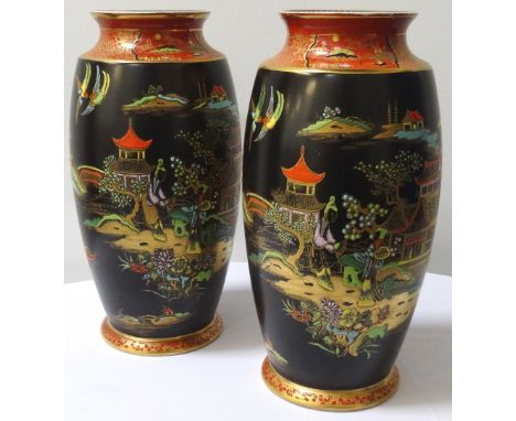 PAIR OF CARLTON WARE VASESdecorated in the Mikado pattern with a black ground and gilt decoration with a terracotta neck and 