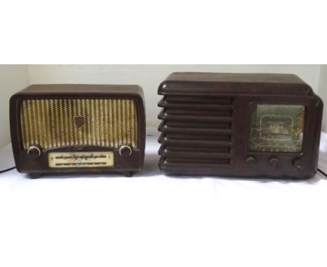 'FULLOTONE' BAKELITE RADIOin a shaped case with a square glass tuning panel with three dials below, 38.5cm wide, together wit