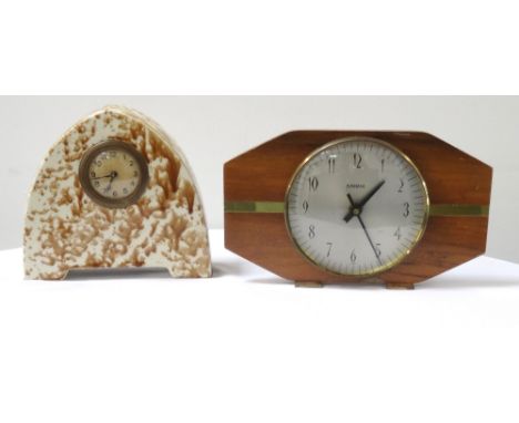 FRENCH POTTERY MANTLE CLOCKwith drip ware decoration to the arched body, a circular dial with Arabic numerals and marked Made