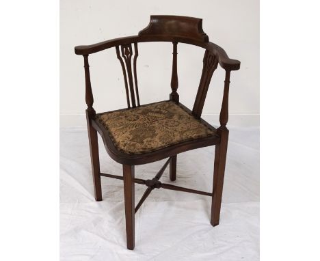 EDWARDIAN INLAID MAHOGANY CORNER CHAIRwith shaped frame, tapestry style padded seat, raised on tapering legs with cross stret