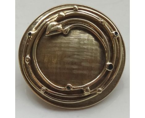 OLA MARIE GORIE NINE CARAT GOLD 'WILLOW' PENDANTof circular form with stylised motif decoration and enamel details, 2.6cm dia