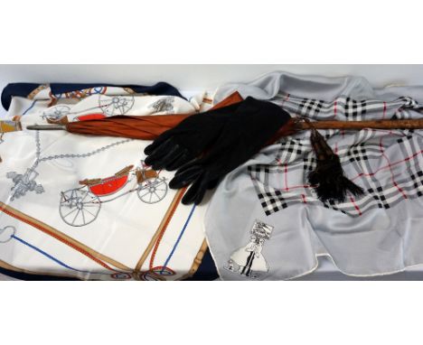 LADIES BURNT ORANGE SILK PARASOLwith a knarled wood handle; together with an equestrian themed Mario Valentino silk scarf; a 