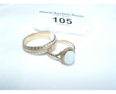 Opal ring in gold setting, together with a wedding band