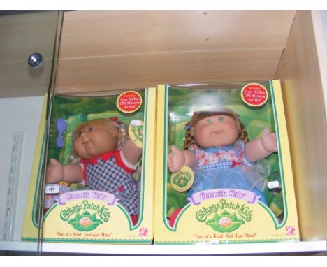 A pair of boxed collectable "Cabbage Patch Kids" 