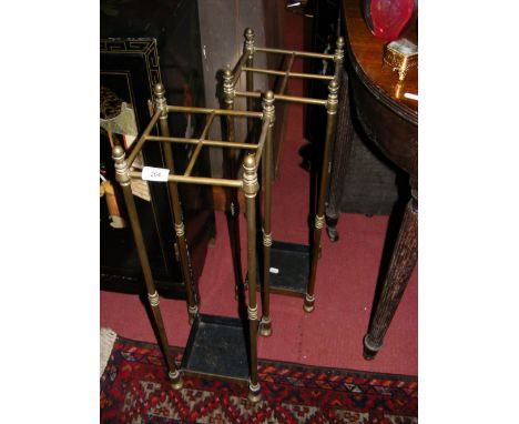 Pair of old brass and cast metal stick/umbrella stands 