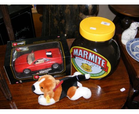 A large Wade "Marmite" jar and cover, together with a Steiff toy dog and a boxed model Ferrari car 
