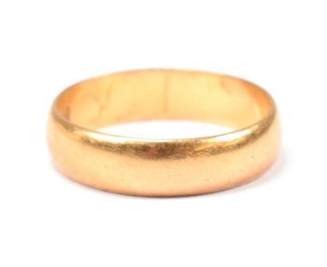 A hallmarked 22ct gold band ring. The 22ct yellow gold band ring hallmarked for London, 1961. Maker's mark W.W.L.D.&nbsp;Size