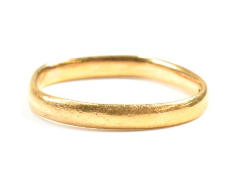 An early 20th century hallmarked 22ct gold band ring AF. The 22ct yellow gold band ring hallmarked for Birmingham, 1924. Make