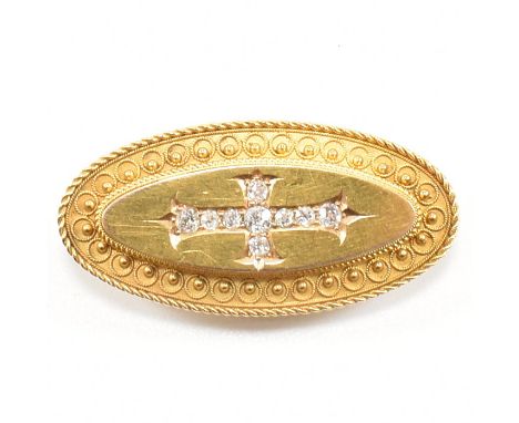 A 19th century Victorian 15ct gold and diamond locket brooch pin. The brooch pin set with nine old cut diamonds in the shape 