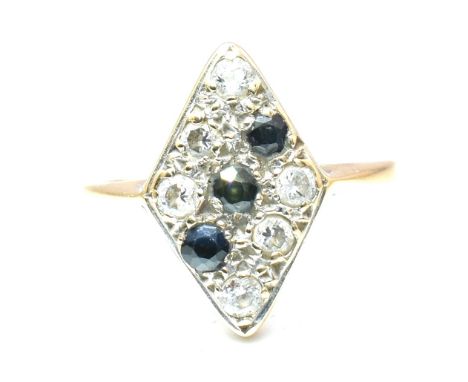 A hallmarked 9ct gold sapphire and CZ navette ring. The 9ct gold navette ring set with six round cut CZ and three round cut s