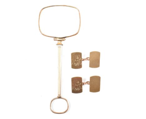 A pair of hallmarked 9ct gold cufflinks and a rolled gold quizzer. The lot to include a pair of hallmarked 9ct yellow gold cu