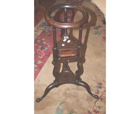 A George III mahogany wig/basin stand 
