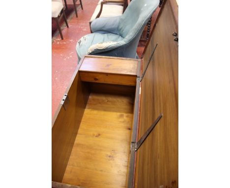 A Victorian upholstered armchair and trunk 106cm wide 