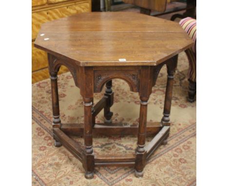 A 17th Century style credence table and Regency style sofa table with lyre supports 