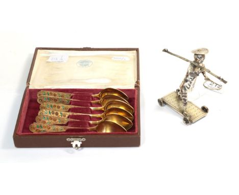 A set of six Russian Soviet silver gilt and enamel tea spoons, in a fitted box, 4.4ozt; and a Chinese Export silver novelty f