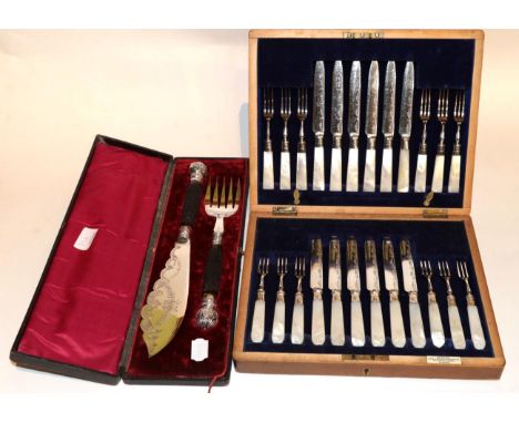 Twelve pairs of electroplated fruit knives and forks, with mother of pearl handled and silver collars, Sheffield 1919, fitted