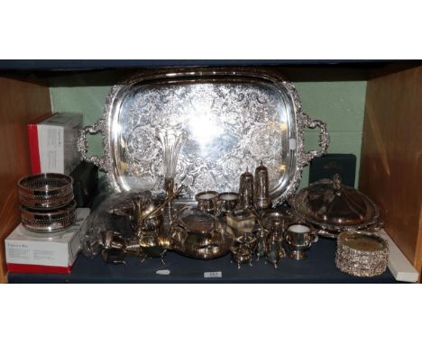 A silver plate twin handled tray, a pair of coasters, two oval dishes, two cased condiment sets and a quantity of flatware