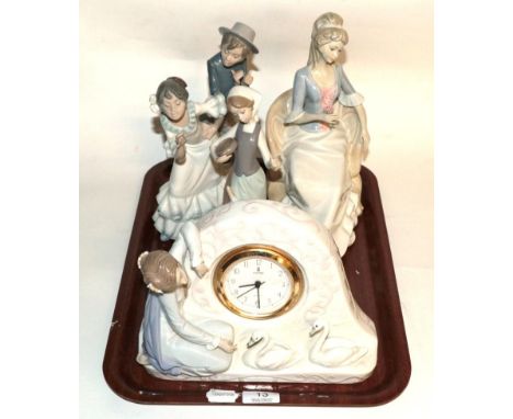 A Lladro figural mantel clock; a Nao group of Spanish dancers; a Lladro model of a girl and geese; and an unmarked figure of 