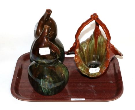 A pair of Linthorpe pottery double gourd vases; and a Linthorpe pottery basket (3)