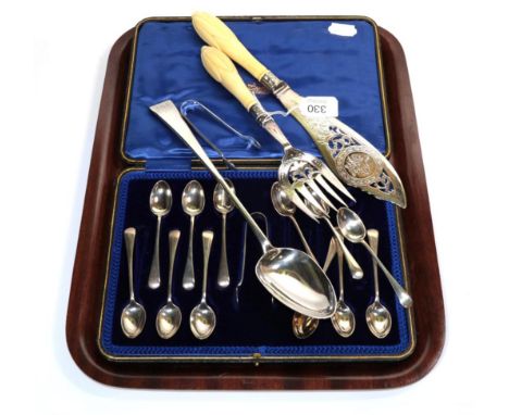 A George III silver basting spoon, possibly William Eley, London 1796; a set of 12 silver teaspoons and tongs, Sheffield 1913