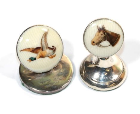 Two silver and enamel menu holders depicting a horses head and a duck in flight 