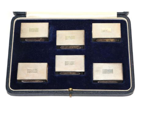A set of six George VI silver matchbox covers, Padgett &amp; Braham Ltd, London 1939, each rectangular with engine turned top
