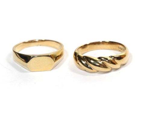 A 9 carat gold signet ring, finger size O; and another 9 carat gold ring, finger size O (2).  Gross weight - 7.64 grams.