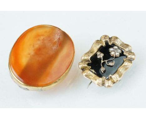 Victorian black enamel seed pearl yellow metal brooch, eleven seed pearls set to the floral sprig, fluted border with engrave