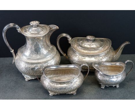 Edwardian matched four piece silver tea service comprising teapot, hot water pot, milk jug and twin handled sugar bowl, repou