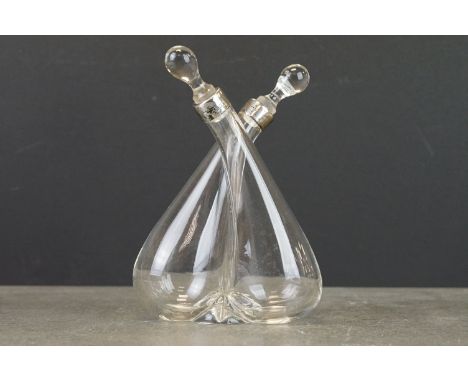 Double oil and vinegar silver collared condiment decanter, glass stoppers, makers mark CS, London possibly 1922, height appro