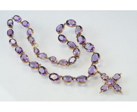 19th century amethyst unmarked rose gold riviere necklace, twenty-nine graduated oval mixed cut amethyst, claw collet set, th