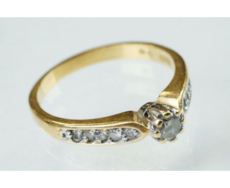 Diamond solitaire 18ct yellow gold ring, the round brilliant cut diamond weighing approx 0.25 carat, claw set, five graduated