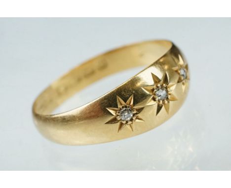 Diamond 18ct yellow gold ring, three small round eight cut diamonds, gypsy set, ring size R 