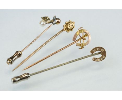 Victorian diamond and pearl yellow and rose metal stick pin modelled as a sprig, small freshwater pearl, four small rose cut 