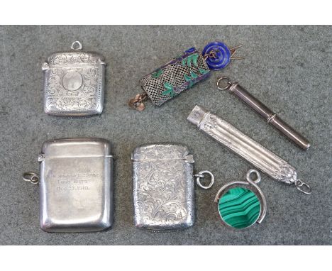 Group of silver items to include three silver vesta cases, a silver propelling cuticle tool and a silver pencil holder (missi