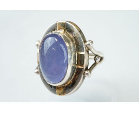 Arik Idan purple jade silver and gold plated ring, the oval cabochon cut jade measuring approx 17mm x 12mm, rubover set, v sh