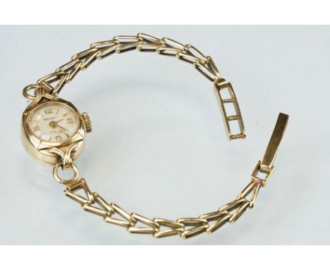 Rotary ladies 9ct yellow gold cased wristwatch, circular champagne dial, Arabic and baton gilt numerals, pencil hands, 9ct go