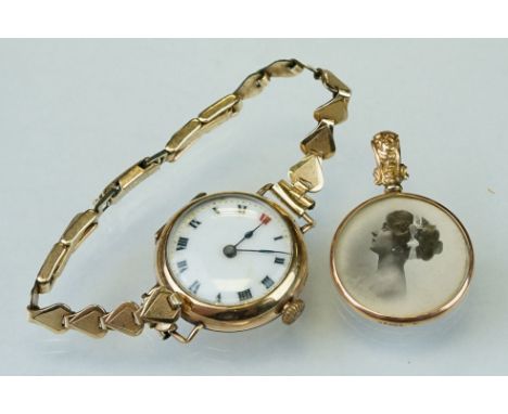 Late Victorian / Edwardian 9ct yellow gold portrait fob, repoussé foliate decoration to the bale; together with a 9ct yellow 