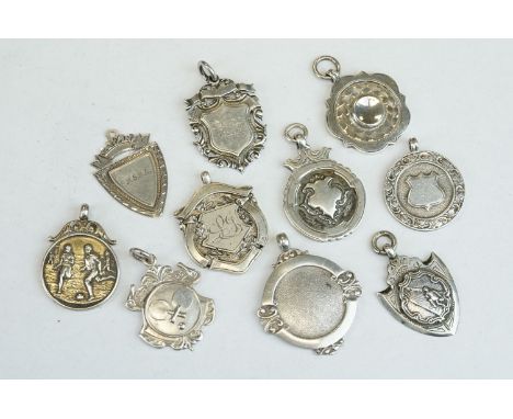 Ten Silver hallmarked sporting related watch fobs, early to mid 20th century, featuring billiards and darts examples 