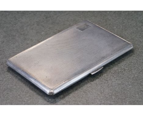 Silver cigarette case, engine turned decoration, blank rectangular cartouche, gilt interior, makers EJE, Birmingham 1945, len