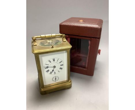   An early 20th century laquered brass repeating carriage clock with alarm, marked apprentice of Breguet, height 12cm