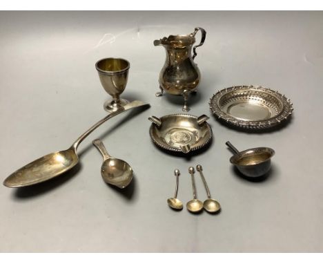   A small group of minor silver including 18th century silver tablespoon, Georgian silver cream jug, Georgian silver caddy sp