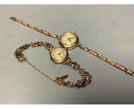   A lady's 1920's 18ct gold manual wind wrist watch, on a 15ct flexible strap, gross 21.3 grams, together with a similar 9ct 