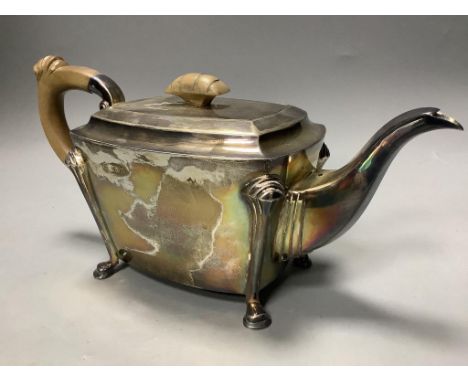   A George VI silver teapot, with engraved presentation inscription, Cooper Brothers &amp; Sons, Sheffield, 1942,gross 27oz.