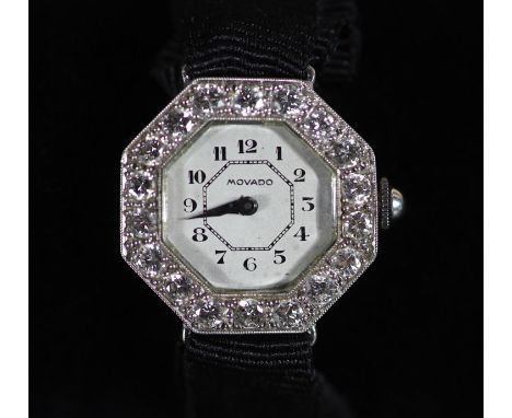   A 1930's/1940's platinum and diamond set Movado octagonal manual wind cocktail watch,the bezel set with eighteen round cut 