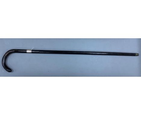   An ebonised sword stick, length 92cm