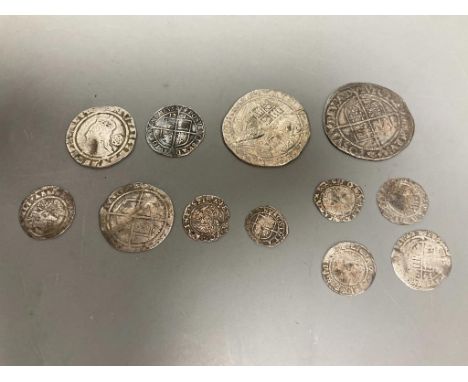   A group of Elizabeth I silver coins - two shillings, 1584 and 1575 sixpences, 1561 and 1569 threepences, 1561 halfgroat and