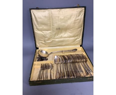   A cased silver part canteen