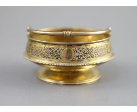   A late 19th century Russian 84 zolotnik silver gilt and niello bonbon basket,assay master A. Romanov?, 1885, diameter 8.5cm